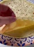 Immagine del passaggio 3 della ricetta Crespelle ai quattro formaggi con nocciole e miele