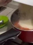 Immagine del passaggio 7 della ricetta Pasta e piselli al pomodoro