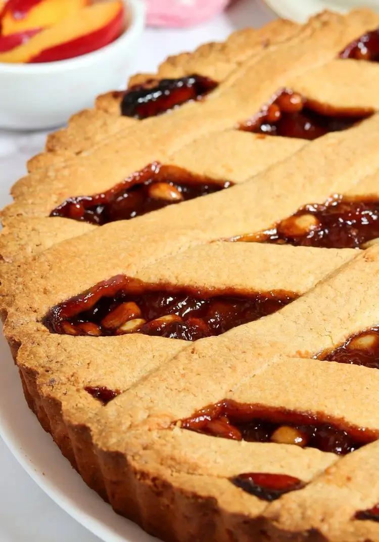 Ricetta Crostata con Pesche e Pinoli di Lericettedivane