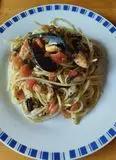 Immagine del passaggio 7 della ricetta Spaghetti gluten free all'impepata di cozze con pomodorini