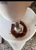 Immagine del passaggio 4 della ricetta Tortino al cioccolato con cuore fondente - 375 kcal 