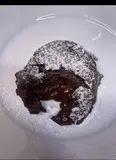 Immagine del passaggio 9 della ricetta Tortino al cioccolato con cuore fondente - 375 kcal 