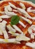 Immagine del passaggio 9 della ricetta Pizza con biga lievitazione 24 h pesto di pistacchio, mortadella e burrata