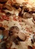 Immagine del passaggio 1 della ricetta Pizza ai funghi