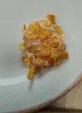 Immagine del passaggio 4 della ricetta Bocconcini di pollo con corn flakles