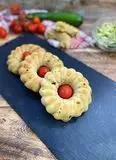 Immagine del passaggio 3777 della ricetta Ciambelle salate con zucchine e pomodori