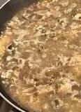 Immagine del passaggio 3 della ricetta Risotto allo zafferano con porcini mantecato con il taleggio