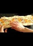Immagine del passaggio 6 della ricetta Involtini di pizza
