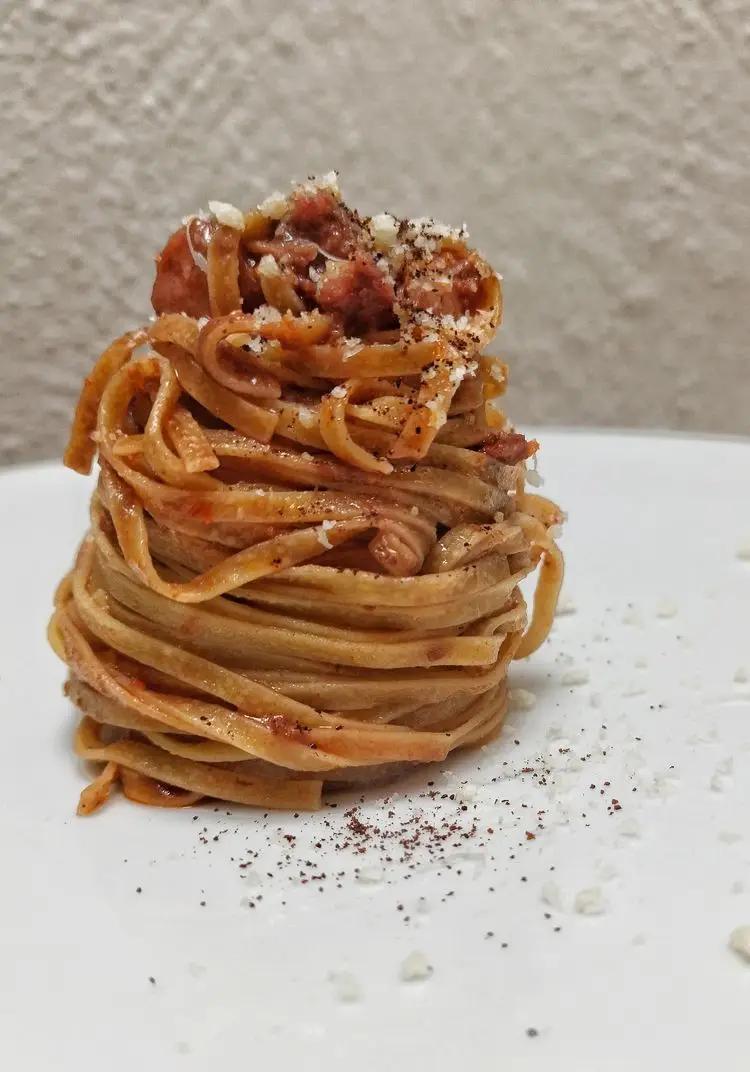 Ricetta Tagliolini all'uovo, con crema di pomodori secchi, pancetta steccata, pecorino, polvere di melanzana. di chef_vincenzo_campanale