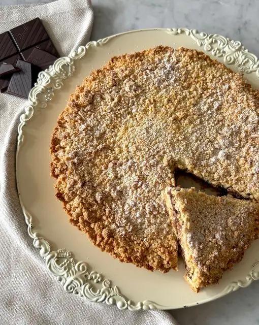 Ricetta Crostata sbriciolata con ricotta e cioccolato di midivertoacucinare