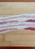 Immagine del passaggio 10 della ricetta ”Involtini di Maiale alla stregattami ripieni di Prugne, Bacon, Castagne, Formaggio Pecorino e Provola” 👩🏻‍🍳
