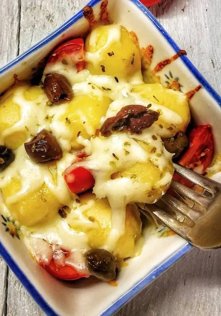 Ricetta Gnocchi ripieni di pomodoro e mozzarella con pomodori piccadilly e olive taggiasche al forno di mammaemma.gnocchi