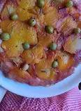 Immagine del passaggio 4 della ricetta Tarte tatîn pesche e rosmarino con uva spina