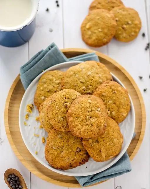 Ricetta Cookies integrali con gocce di cioccolato e mandorle di cappuccinoaddicted