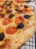 Immagine del passaggio 4 della ricetta Focaccia olive e pomodorini
