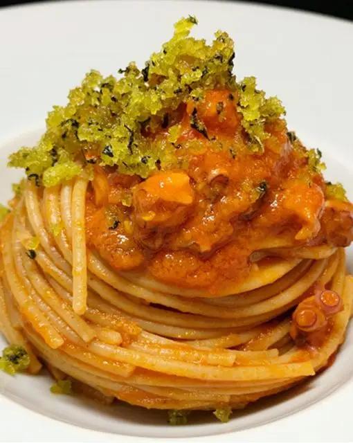 Ricetta Spaghetti integrali con ragù di polpo e pane aromatizzato al finocchietto di unastellaincucina