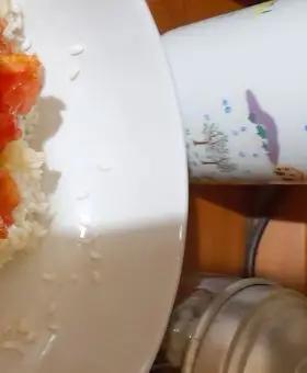 Immagine del passaggio 4 della ricetta Pomodori ripieni di riso e patate