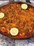 Immagine del passaggio 6 della ricetta Paellas/pane rustico/paella/ tortelli ripieni di Andria, salsiccia, pecorino, erbe aromatiche