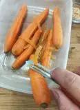 Immagine del passaggio 4 della ricetta Spaghetti di carote con pesto di rucola e nocciole tostate