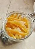 Immagine del passaggio 11 della ricetta Scorzette di arancia candita
