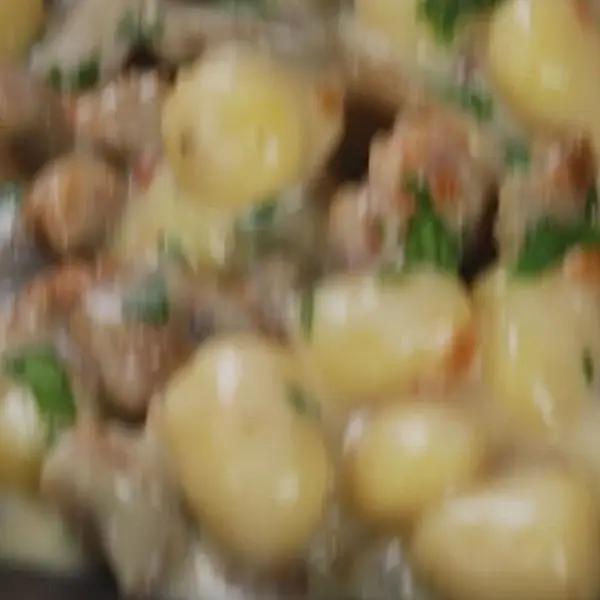 Ricetta Chicche di patate alla fonduta di taleggio con funghi e salsiccia di altacucina