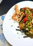 Immagine del passaggio 4 della ricetta Tagliolini neri con scampi e zucchine