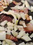 Immagine del passaggio 3 della ricetta Fusilli con pancetta in crema di fave e finocchi