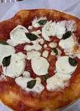 Immagine del passaggio 5 della ricetta Pizza margherita con bufala