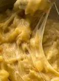 Immagine del passaggio 9 della ricetta Pasta e patate con fior di latte