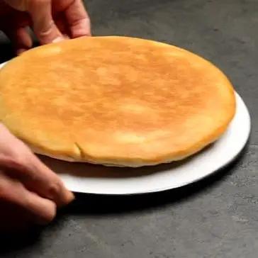 Immagine del passaggio 5 della ricetta Focaccia in padella alla parmigiana di melanzane